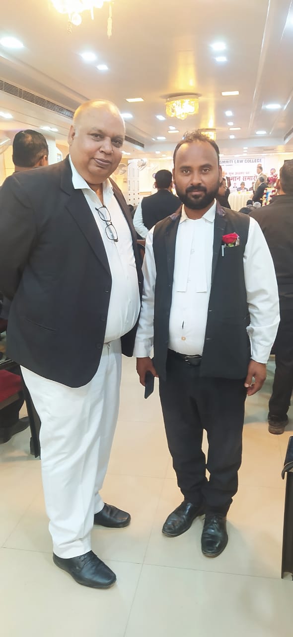 Anoop Kumar Srivastava with legal professionals at an event